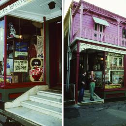 The proprietor and Walter Cameron Cook stand outside Mr Smiles curio and second-hand shop, upper Cuba Street, 1986.