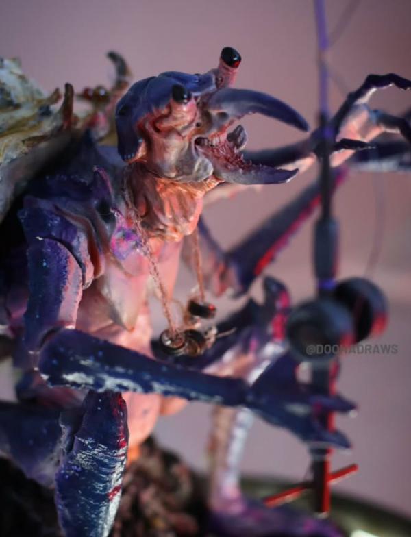 An alien figurine-type sculpture by Dana Franklin for the Non Disclosed Artist Exhibition at Thistle Hall Gallery
