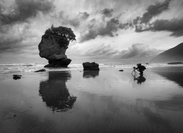 Keith Molloy Photographer in action at Motukiekie Beach