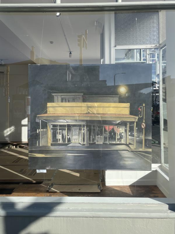 A painting of a shop front at night, in the window of Thistle Hall Gallery