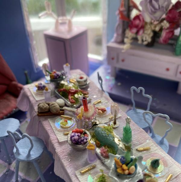 A tiny hand-made table of goods by Hannah Truly