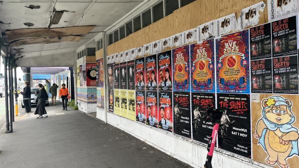 Photograph of poster wall on Cuba Street, Wellington