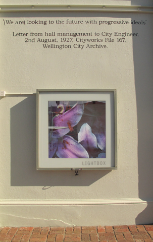 Lightbox from outside on Arthur Street, artwork by Lee Jenson